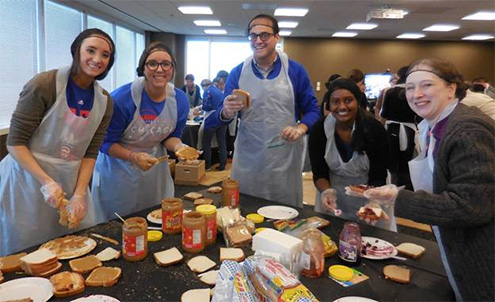 Lawyers in Chicago office make sandwiches